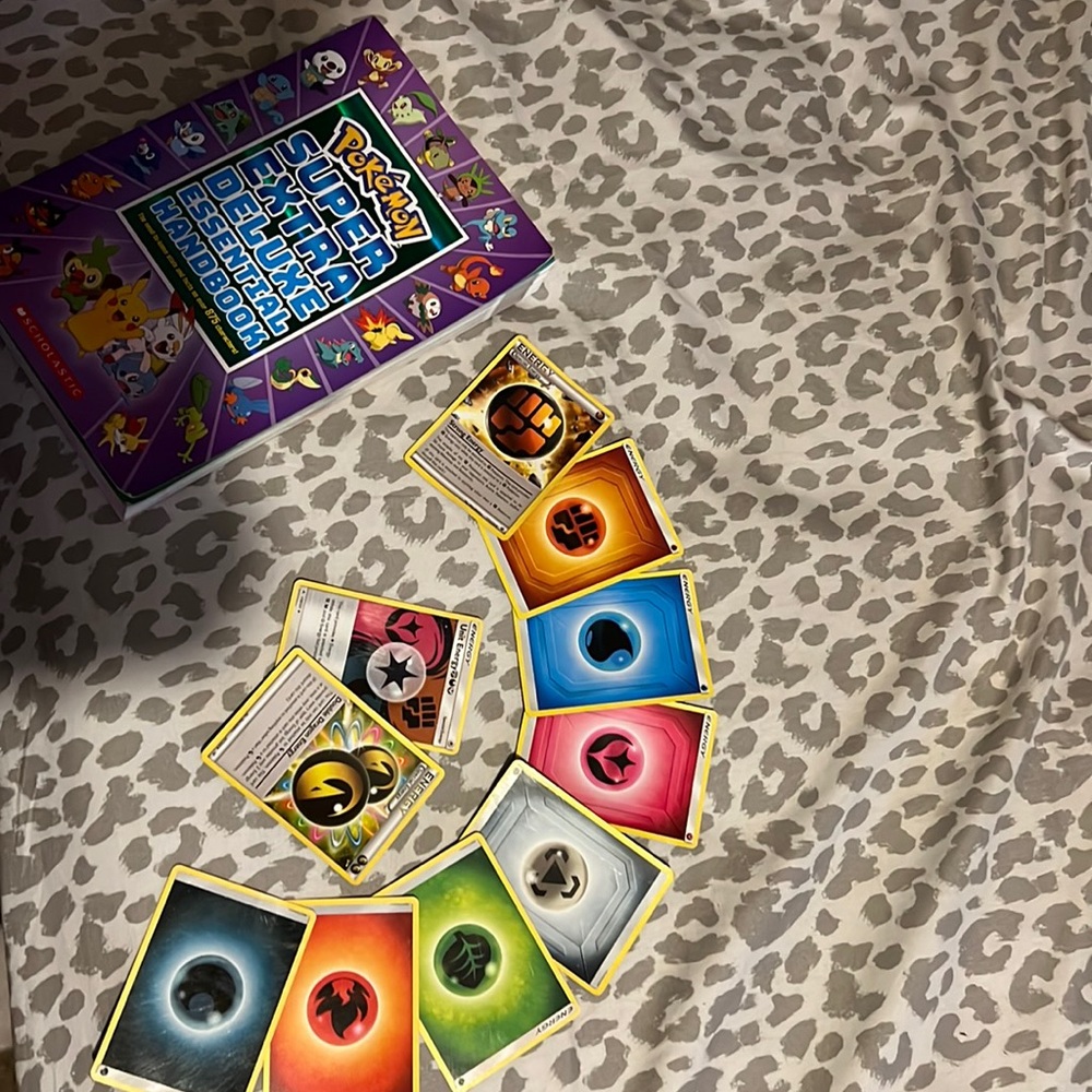 Pokémon book and cards